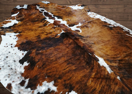 Why you should buy a real cowhide rug not faux cowhide rug?