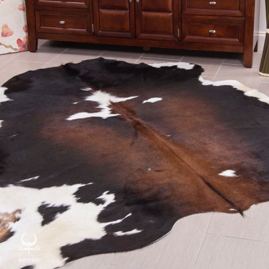 black and brown cowhide rug
