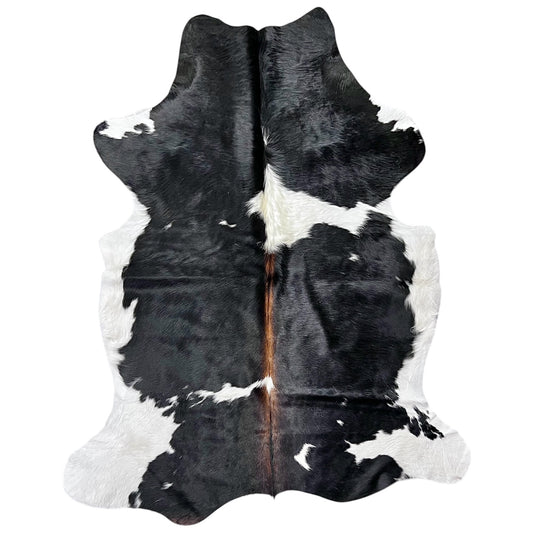 Black and white cowhide rug