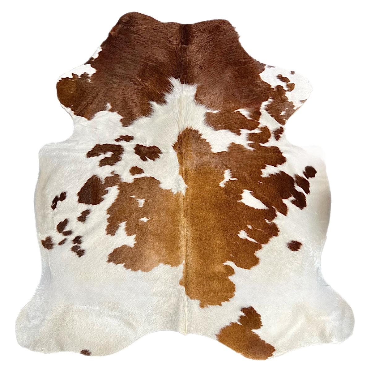 brown and white cowhide rug for sale
