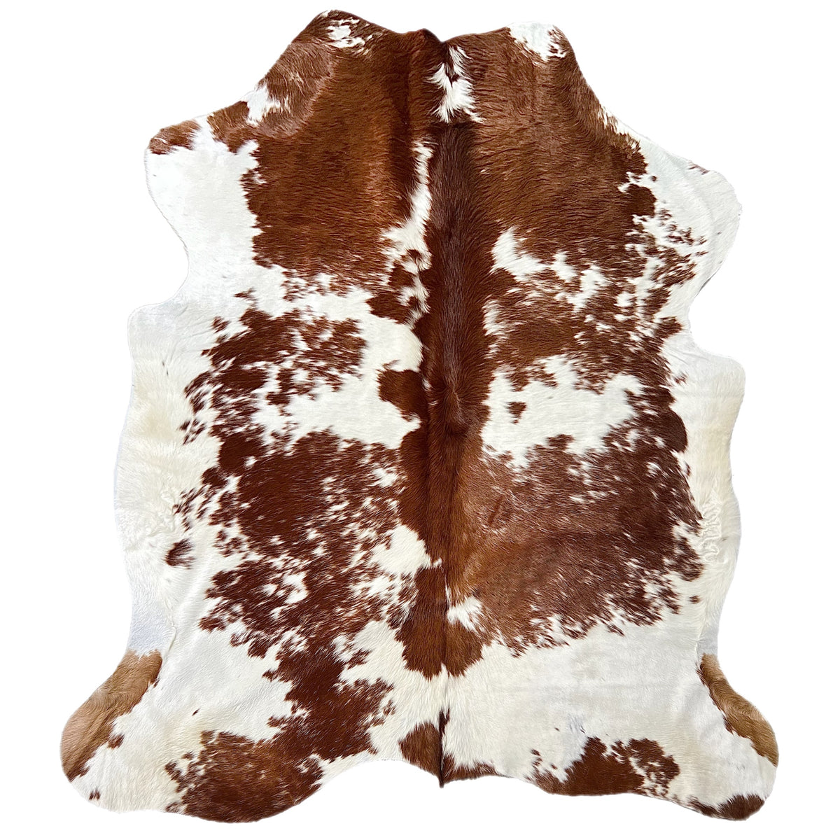 brown and white cowhide rug for sale