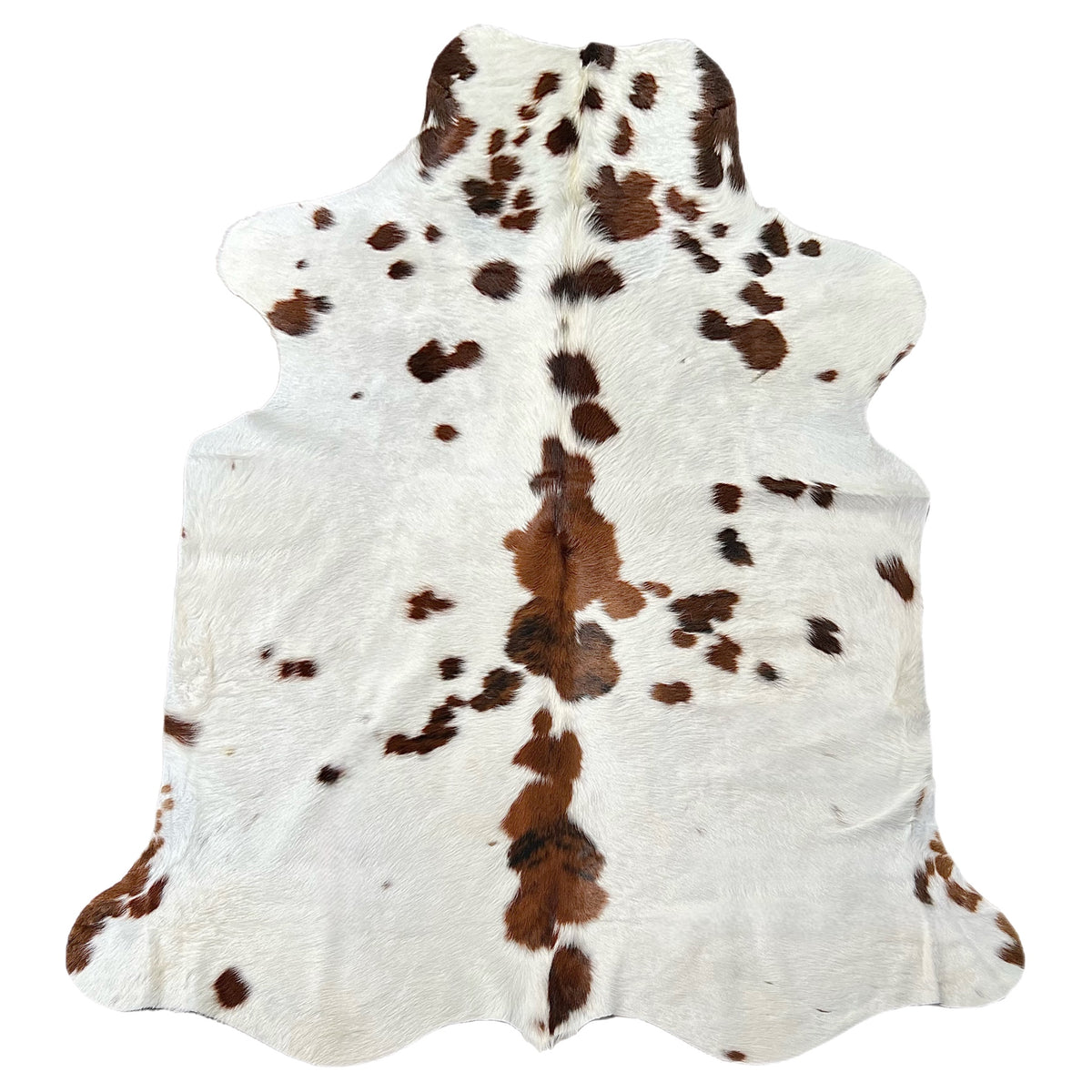 Large tricolor cowhide rug