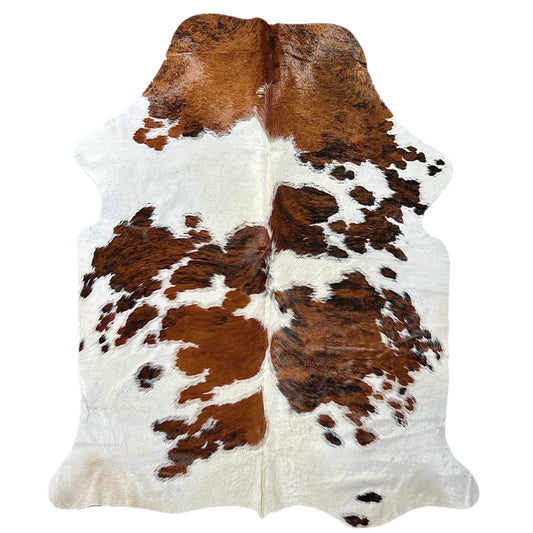 Large tricolor cowhide rug