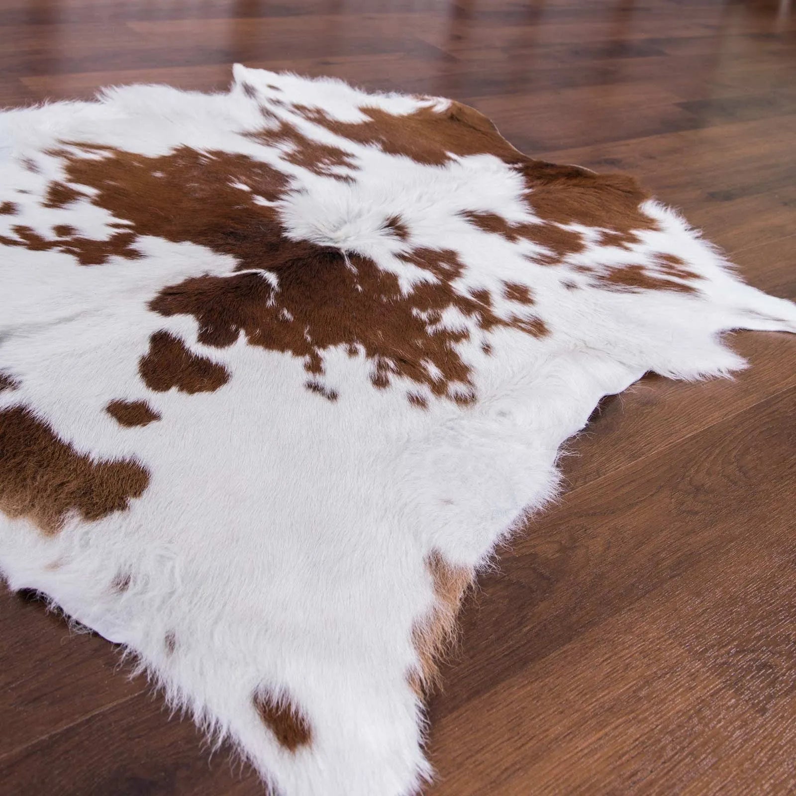 Brown and White Calf Skin Rug