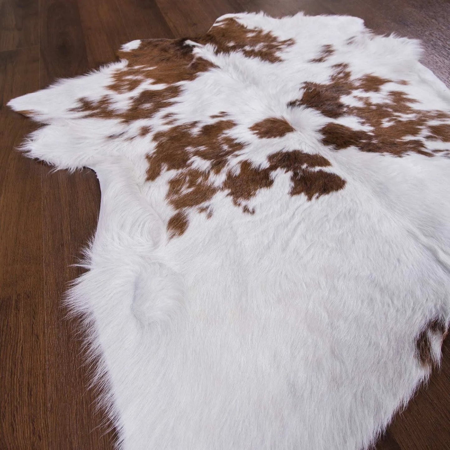 Brown and White Calf Skin Rug