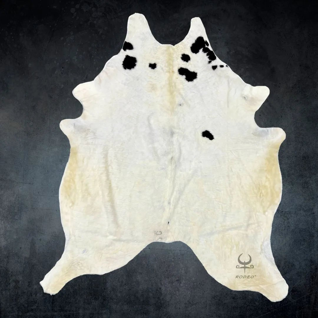 Natural White cowhide with spots