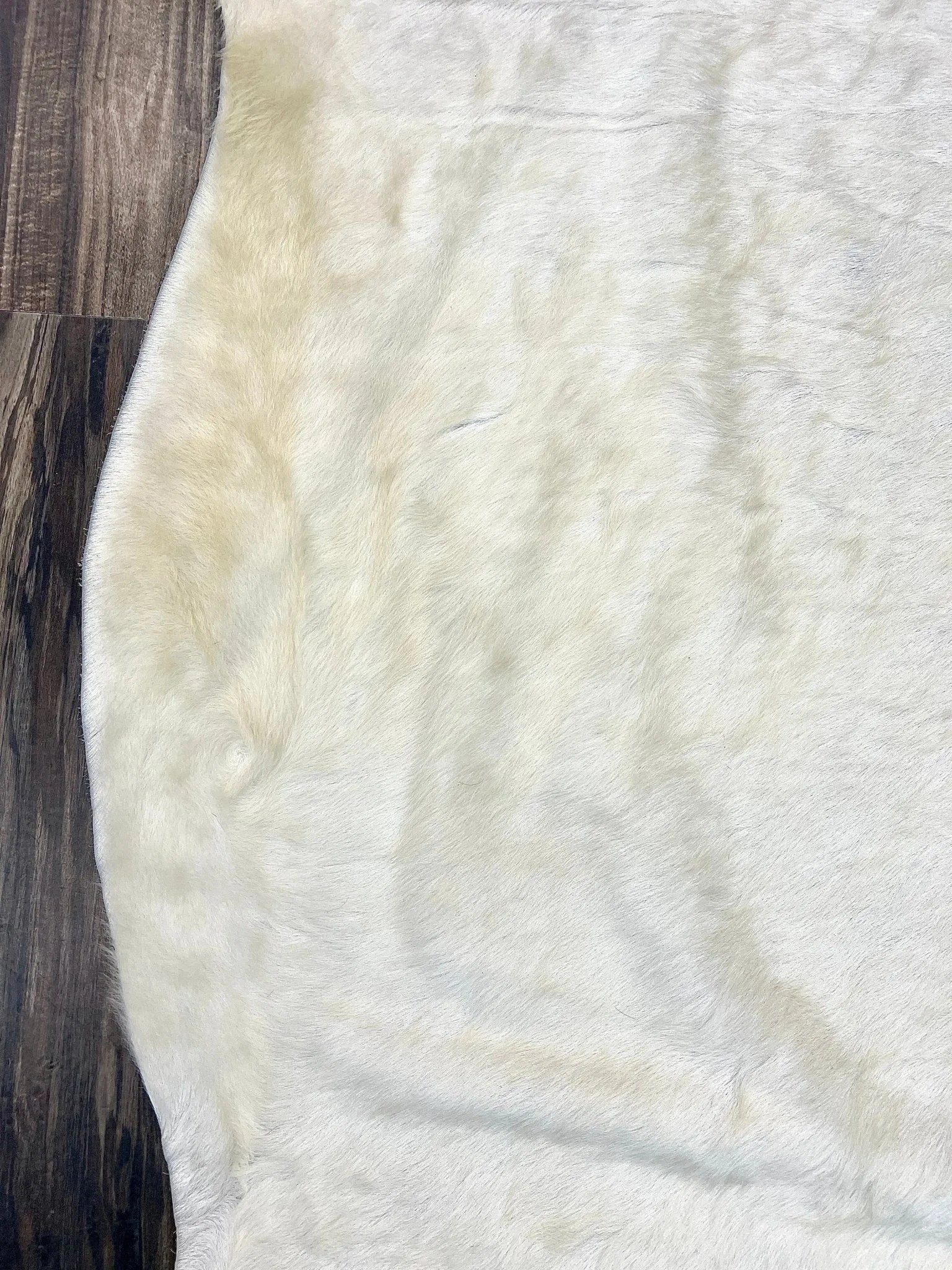 Natural White cowhide with spots