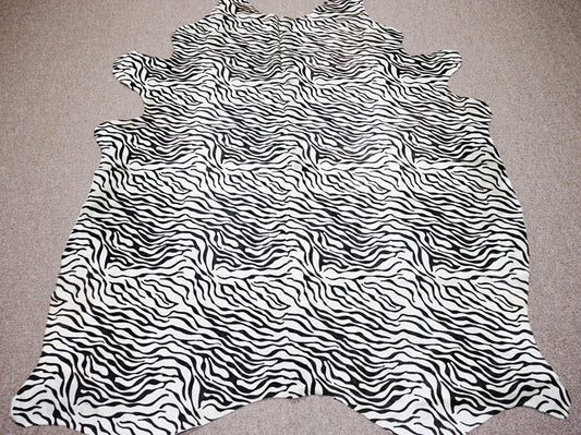 Zebra print cowhide rug